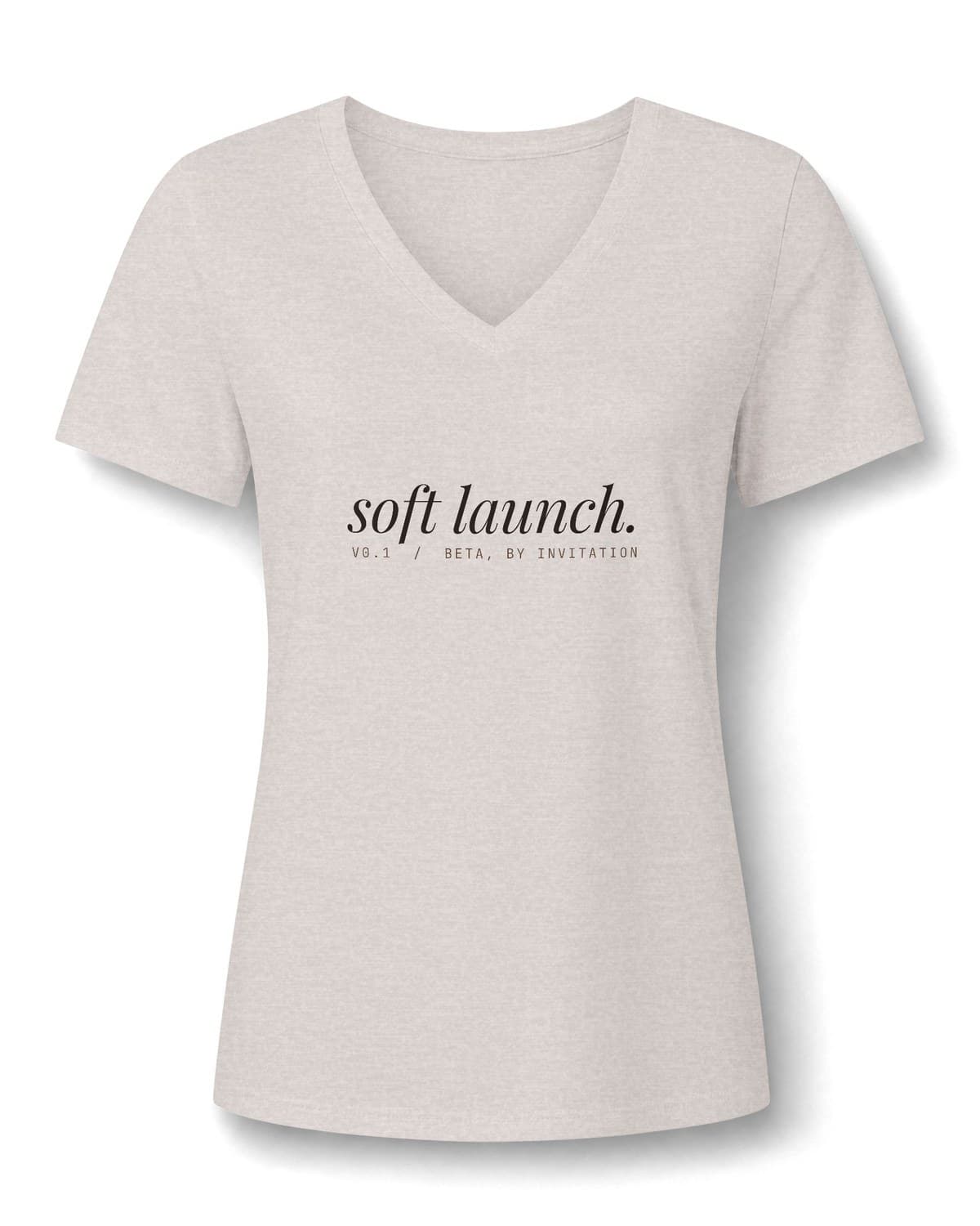 Heather Dust V-neck tee with soft launch. set in espresso italic across the chest