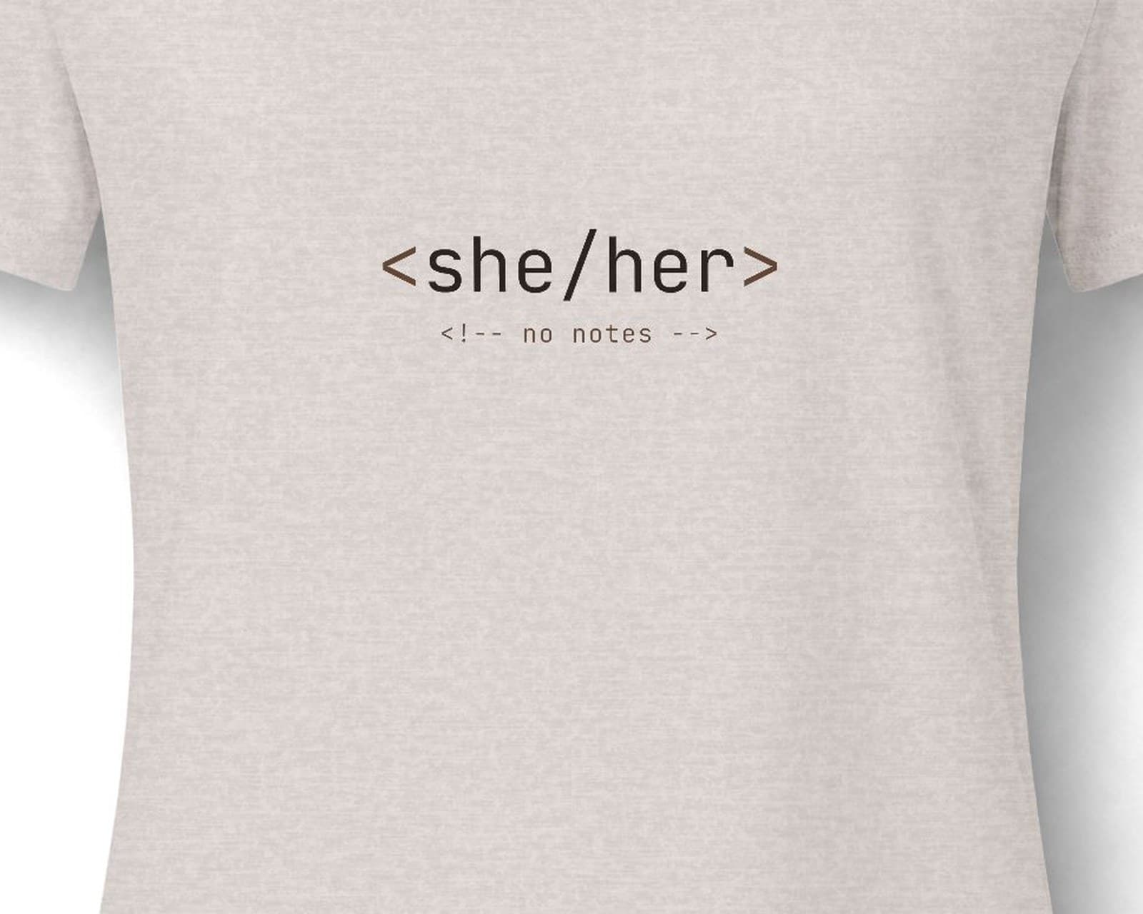 Close up of the chest print on the she/her tee