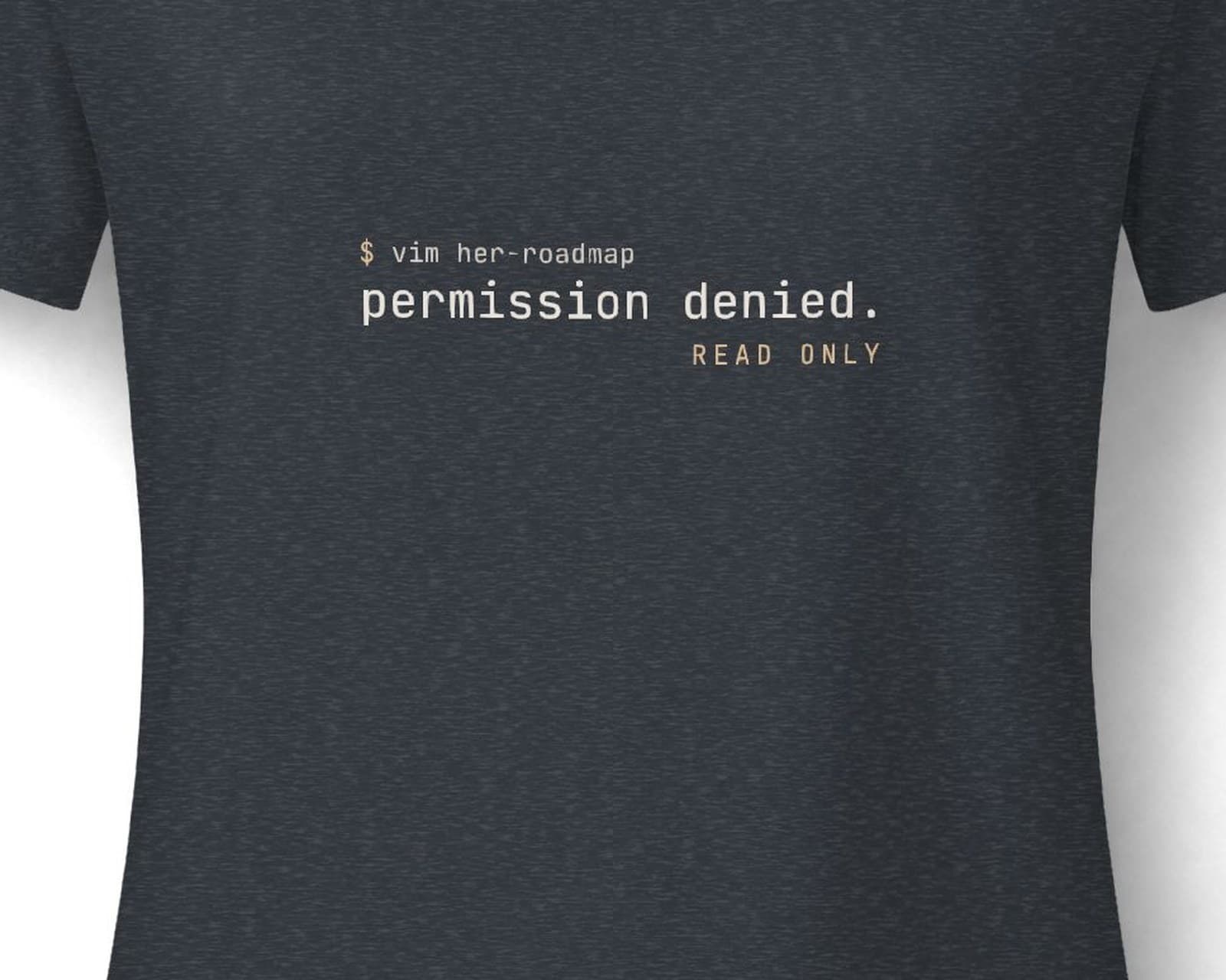 Close up of the chest print on the permission denied tee
